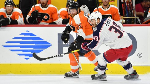 Oct 26, 2019; Philadelphia, PA, USA; Philadelphia Flyers right wing Jakub Voracek (93) and Columbus Blue Jackets center Boone Jenner (38) battle for the puck during the first period at Wells Fargo Center. Mandatory Credit: Eric Hartline-USA TODAY Sports