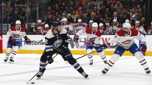 Columbus Blue Jackets center Emil Bemstrom (52) looks to pass as Montreal Canadiens center Nate Thompson (44) defends during the first period at Nationwide Arena.