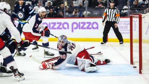 Winnipeg Jets forward Nikolaj Ehlers (not pictured) scores a goal past Columbus Blue Jackets goalie Elvis Merzlikins (90) during the second period at Bell MTS Place.