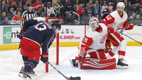 Cam Atkinson scores a power play goal against Jimmy Howard at Nationwide Arena