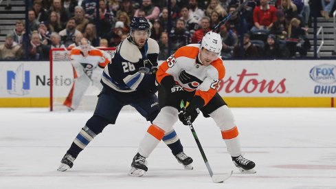 Nov 27, 2019; Columbus, OH, USA; Philadelphia Flyers left wing James van Riemsdyk (25) skates with the puck as\Columbus Blue Jackets right wing Oliver Bjorkstrand (28) trails the play during the first period at Nationwide Arena.