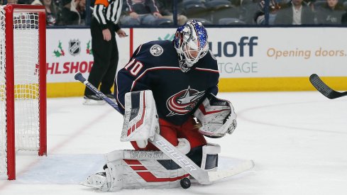 Dec 16, 2019; Columbus, OH, USA; Columbus Blue Jackets goalie Joonas Korpisalo (70) makes a save against the Washington Capitals during the first period at Nationwide Arena. Mandatory Credit: Russell LaBounty-USA TODAY Sports