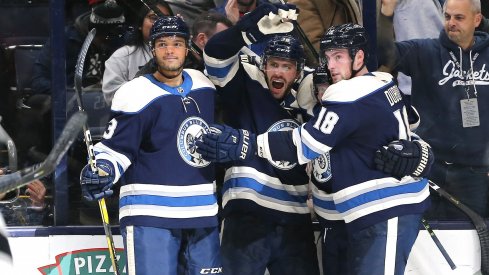 Seth Jones, Boone Jenner, Gustav Nyquist and Pierre-Luc Dubois celebrate Jenner's tying goal for the Columbus Blue Jackets against the Los Angeles Kings on Dec. 19.