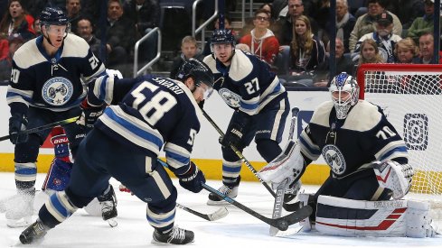 David Savard and Ryan Murray keep the puck out of the net