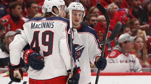 Dec 27, 2019; Washington, District of Columbia, USA; Columbus Blue Jackets left wing Jakob Lilja (15) celebrates with teammates after scoring a goal against the Washington Capitals in the second period at Capital One Arena. Mandatory Credit: Geoff Burke-USA TODAY Sports