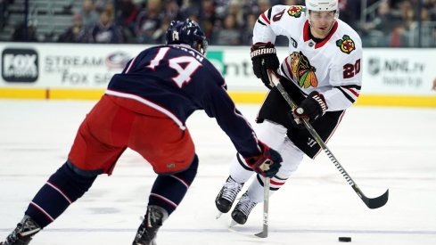 Chicago Blackhawks left wing Brandon Saad (20) skates against Columbus Blue Jackets defenseman Dean Kukan (14) in the third period at Nationwide Arena.