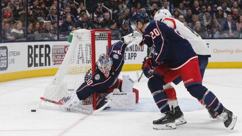 Dec 31, 2019; Columbus, Ohio, USA; Columbus Blue Jackets goalie Elvis Merzlikins (90) makes a sticks save against the Florida Panthers during the first period at Nationwide Arena.