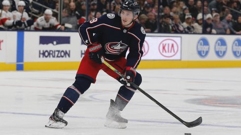 Dec 31, 2019; Columbus, Ohio, USA; Columbus Blue Jackets defenseman Zach Werenski (8) looks to pass against the Florida Panthers during the second period at Nationwide Arena.