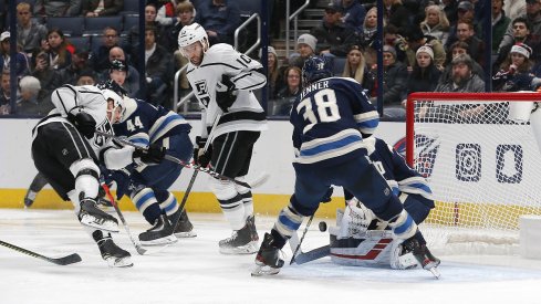 onas Korpisalo makes a save against the Los Angeles Kings
