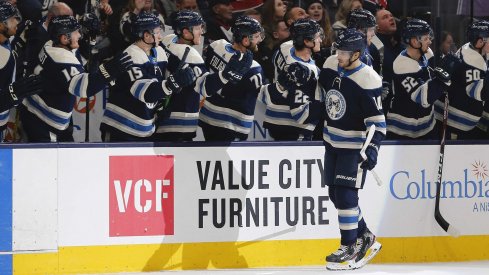 Jan 14, 2020; Columbus, Ohio, USA; Columbus Blue Jackets center Alexander Wennberg (10) celebrates a goal against the Boston Bruins during the first period at Nationwide Arena.