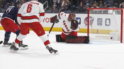 Jan 16, 2020; Columbus, Ohio, USA; Columbus Blue Jackets left wing Nick Foligno (71) sends the puck past Carolina Hurricanes goalie Petr Mrazek (34) for the game winning goal during the third period at Nationwide Arena.