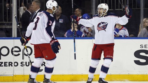 Jan 19, 2020; New York, New York, USA; Columbus Blue Jackets right wing Oliver Bjorkstrand (28) celebrates with teammates after scoring the game winning goal during the third period against the New York Rangers at Madison Square Garden.