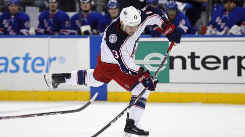 Jan 19, 2020; New York, New York, USA; Columbus Blue Jackets right wing Cam Atkinson (13) takes a shot during the first period against the New York Rangers at Madison Square Garden.