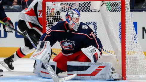 Feb 24, 2020; Columbus, Ohio, USA; Columbus Blue Jackets goaltender Joonas Korpisalo (70) follows the puck in play against the Ottawa Senators in the second period at Nationwide Arena. Mandatory Credit: Aaron Doster-USA TODAY Sports