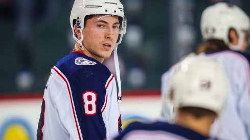 Columbus Blue Jackets defenseman Zach Werenski (8) skates during the warmup period against the Calgary Flames at Scotiabank Saddledome.