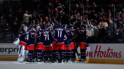 Feb 24, 2020; Columbus, Ohio, USA; The Columbus Blue Jackets bench reacts as center Emil Bemstrom (not pictured) scores the game winning against the Ottawa Senators in the overtime period at Nationwide Arena.