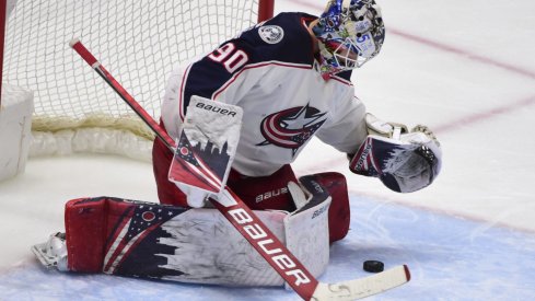 Columbus Blue Jackets goaltender Elvis Merzlikins (90) blocks a shot on net by the Vancouver Canucks during the third period at Rogers Arena.