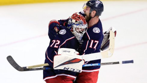 Apr 16, 2019; Columbus, OH, USA; Columbus Blue Jackets goaltender Sergei Bobrovsky (72) reacts with center Brandon Dubinsky (17) against the Tampa Bay Lightning in game four of the first round of the 2019 Stanley Cup Playoffs at Nationwide Arena.