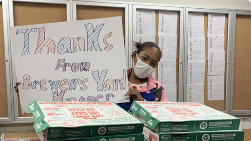 Employees at the Brewer's Yard Kroger in Columbus thank Columbus Blue Jackets forwards Pierre-Luc Dubois and Oliver Bjorkstrand for a pizza donation.