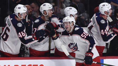 Nov 12, 2019; Montreal, Quebec, CAN; Columbus Blue Jackets forward Eric Robinson (50) reacts with teammates after scoring a goal against the Montreal Canadiens during the first period at the Bell Centre.