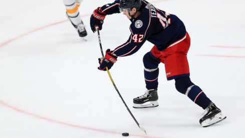 Columbus Blue Jackets center Alexandre Texier (42) skates with the puck in the third period against the Ottawa Senators at the Canadian Tire Centre.