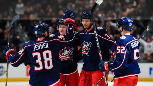 Columbus Blue Jackets defenseman Seth Jones (middle) celebrates with teammates \after scoring a goal against the Colorado Avalanche in the second period at Nationwide Arena.