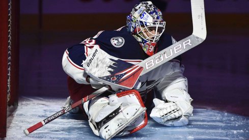 Columbus Blue Jackets goalie Elvis Merzlikins (90) stretches during the second period of the game against the Montreal Canadiens at the Bell Centre.
