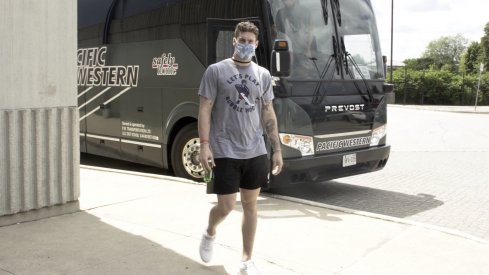 Pierre-Luc Dubois arrives at Scotiabank Arena in Toronto wearing a HOMAGE-branded "Let's Play Bubble Hockey" t-shirt.