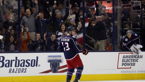 Columbus Blue Jackets forward Cam Atkinson skates with the puck against the St. Louis Blues at Nationwide Arena.