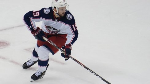 Aug 9, 2020; Toronto, Ontario, CAN; Columbus Blue Jackets forward Liam Foudy (19) carries the puck against the Toronto Maple Leafs during the third period of game five of the Eastern Conference qualifications at Scotiabank Arena. Columbus eliminated Toronto with a win.