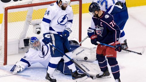 Tampa Bay Lightning goaltender Andrei Vasilevskiy (88) dives to make a save as Tampa Bay Lightning left wing Pat Maroon (14) plays against Columbus Blue Jackets left wing Nick Foligno (71) in the second period in game four of the first round of the 2020 Stanley Cup Playoffs at Scotiabank Arena.