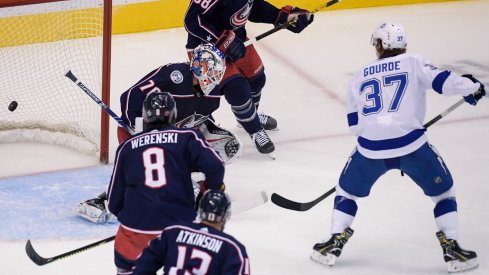 Yanni Gourde tips in the game-winning-goal for the Tampa Bay Lightning