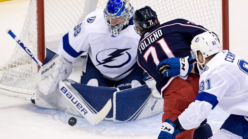 Aug 17, 2020; Toronto, Ontario, CAN; Columbus Blue Jackets left wing Nick Foligno (71) attempts a shot on Tampa Bay Lightning goaltender Andrei Vasilevskiy (88) as defenseman Erik Cernak (81) trails in the first period in game four of the first round of the 2020 Stanley Cup Playoffs at Scotiabank Arena.