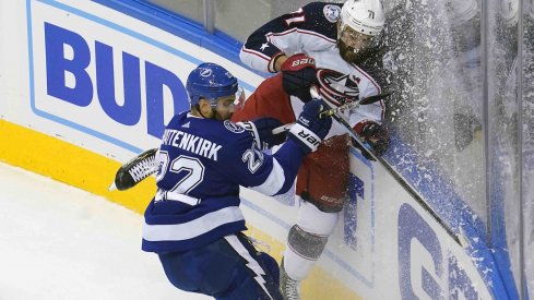 Tampa Bay Lightning defenseman Kevin Shattenkirk (22) hits Columbus Blue Jackets left wing Nick Foligno (71) during the first period in game five of the first round of the 2020 Stanley Cup Playoffs