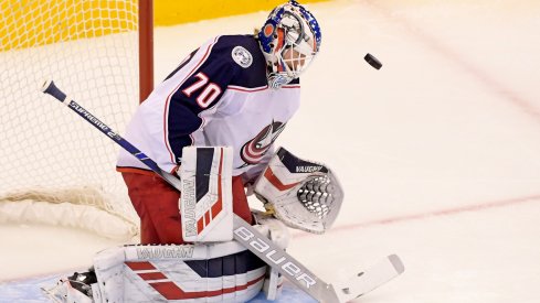 Aug 13, 2020; Toronto, Ontario, CAN; Columbus Blue Jackets goaltender Joonas Korpisalo (70) makes a save against the Tampa Bay Lightning during the first period in game two of the first round of the 2020 Stanley Cup Playoffs at Scotiabank Arena.