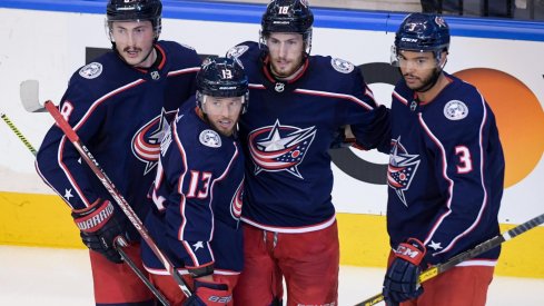 Aug 17, 2020; Toronto, Ontario, CAN; Columbus Blue Jackets right wing Cam Atkinson (13) celebrates with teammates , defenseman Zach Werenski (8), center Pierre-Luc Dubois (18), and defenseman Seth Jones (3) after scoring a goal in the second period in game four of the first round of the 2020 Stanley Cup Playoffs at Scotiabank Arena.