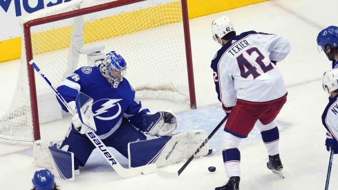 Tampa Bay Lightning goaltender Andrei Vasilevskiy (88) blocks a shot against Columbus Blue Jackets center Alexandre Texier (42) during the second period in game five of the first round of the 2020 Stanley Cup Playoffs at Scotiabank Arena.