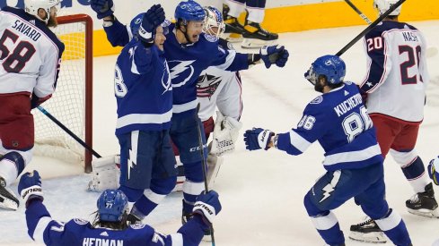 Aug 19, 2020; Toronto, Ontario, CAN; Tampa Bay Lightning forward Anthony Cirelli (71) celebrates scoring the tying goal with forward Ondrej Palat (18) and forward Nikita Kucherov (86) against Columbus Blue Jackets goaltender Joonas Korpisalo (70) to force overtime in game five of the first round of the 2020 Stanley Cup Playoffs at Scotiabank Arena.