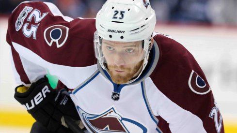 Mar 4, 2017; Winnipeg, Manitoba, CAN; Colorado Avalanche center Mikhail Grigorenko (25) lines up at the face off circle during the first period against the Winnipeg Jets at the MTS Centre.