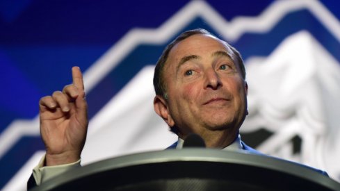 NHL commissioner Gary Bettman asks for the crowd to quiet down during the 2019 NHL Draft