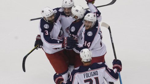 Aug 9, 2020; Toronto, Ontario, CAN; Columbus Blue Jackets forward Gustav Nyquist (14) and forward Boone Jenner (38)and defenseman Seth Jones (3) and forward Nick Foligno (71) celebrate a goal by defenseman Zach Werenski (8) against the Toronto Maple Leafs during the first period of game five of the Eastern Conference qualifications at Scotiabank Arena.