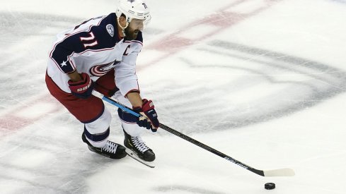 Aug 19, 2020; Toronto, Ontario, CAN; Columbus Blue Jackets left wing Nick Foligno (71) moves the puck against the Tampa Bay Lightning during the first period in game five of the first round of the 2020 Stanley Cup Playoffs at Scotiabank Arena.