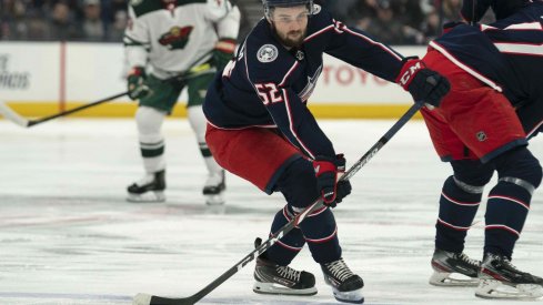 Feb 28, 2020; Columbus, Ohio, USA; Columbus Blue Jackets center Emil Bemstrom (52) looks to pass the puck during the game against the Minnesota Wild at Nationwide Arena.