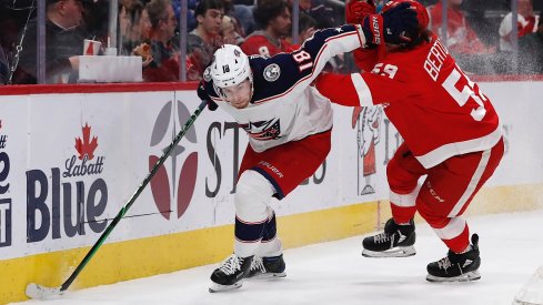 Pierre-Luc Dubois shields the puck from Tyler Bertuzzi