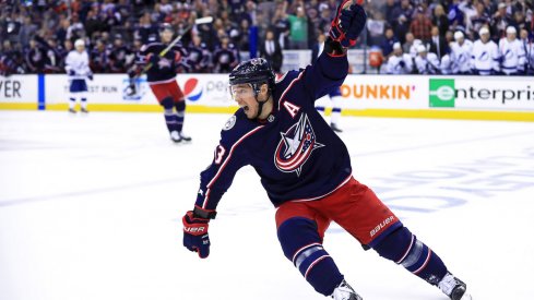 Columbus Blue Jackets forward Cam Atkinson skates with the puck against the St. Louis Blues at Nationwide Arena.