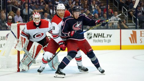 Columbus Blue Jackets center Pierre-Luc Dubois battles against the Carolina Hurricanes at Nationwide Arena.