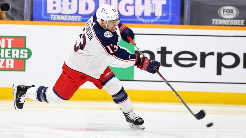 Jan 14, 2021; Nashville, Tennessee, USA; Columbus Blue Jackets forward Cam Atkinson (13) attempts a shot during the second period against the Nashville Predators at Bridgestone Arena.