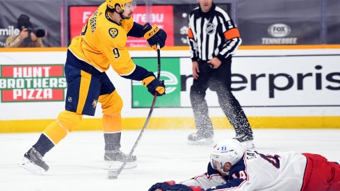 Filip Forsberg scores past a block attempt from Michael Del Zotto at Bridgestone Arena