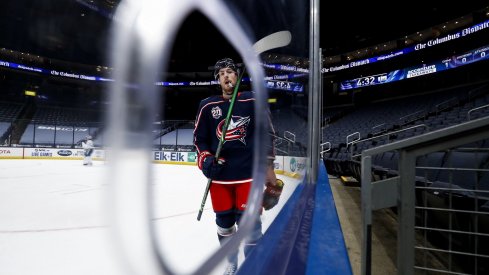 Jan 21, 2021; Columbus, Ohio, USA; Columbus Blue Jackets center Pierre-Luc Dubois (18) skates along the boards during a stop in play against the Tampa Bay Lightning in the first period at Nationwide Arena.