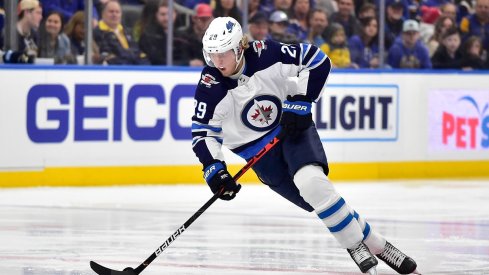 Dec 29, 2019; St. Louis, Missouri, USA; Winnipeg Jets right wing Patrik Laine (29) handles the puck during the first period against the St. Louis Blues at Enterprise Center. 